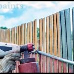 Painting A Fence With A Sprayer