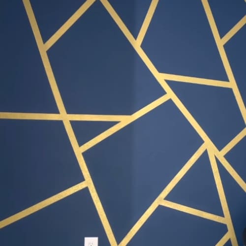 geometric wall paint design with tape