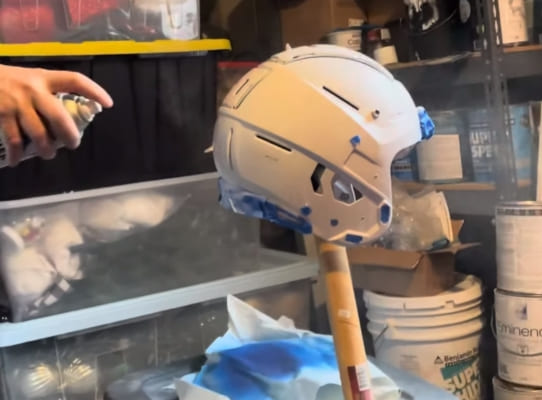 Spray paint a football helmet at home