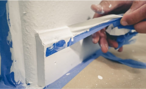 How to stop paint bleeding under tape